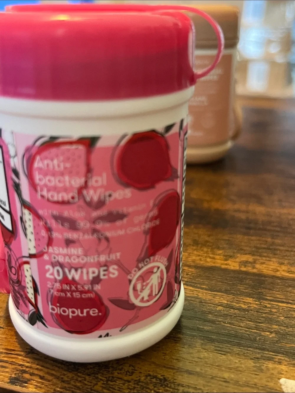 Biopure Anti-bacterial Hand Wipes in pop top plastic container with a clip